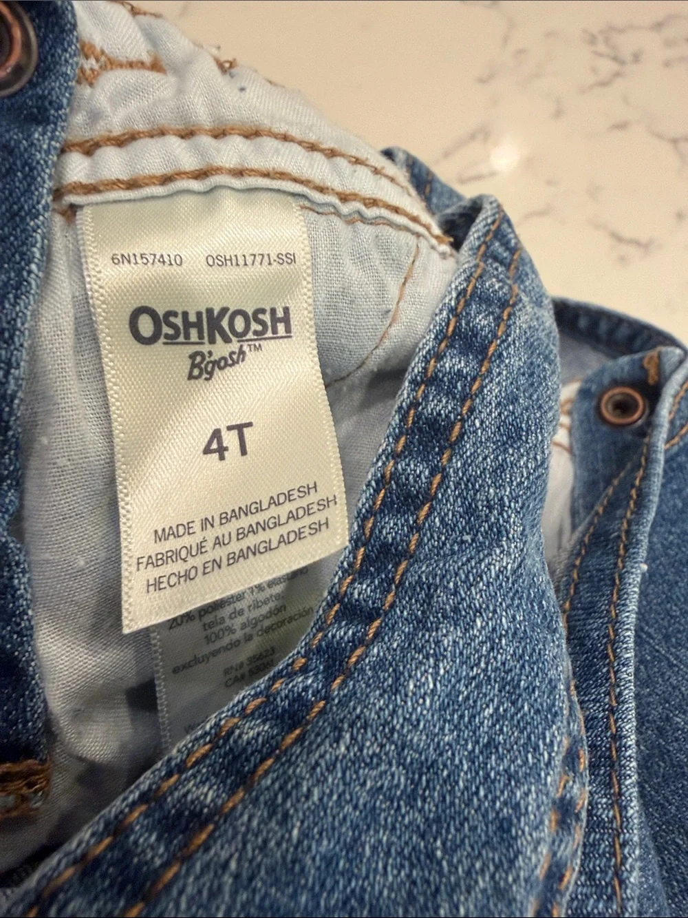 OshKosh B'gosh Denim Shortall Overalls in Medium Blue with Floral Trim